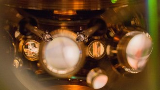 A new atomic clock contains two ultrasensitive thermometers (center) that enable scientists to reduce any timekeeping errors due to heat from the surrounding environment.