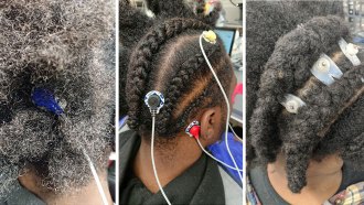 EEG electrodes on the heads of three different people