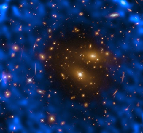 a galaxy cluster image combined with radio-telescope data (blue) shows ripples