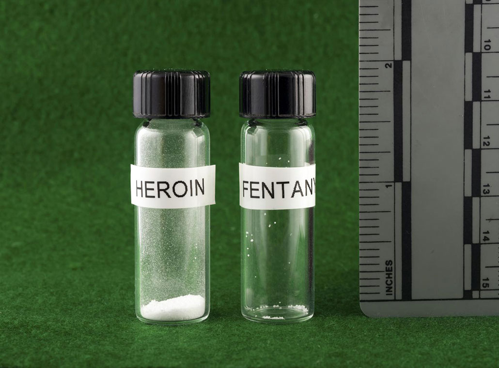 two vials one with heroin, and one with fentanyl. Both indicate the amount of