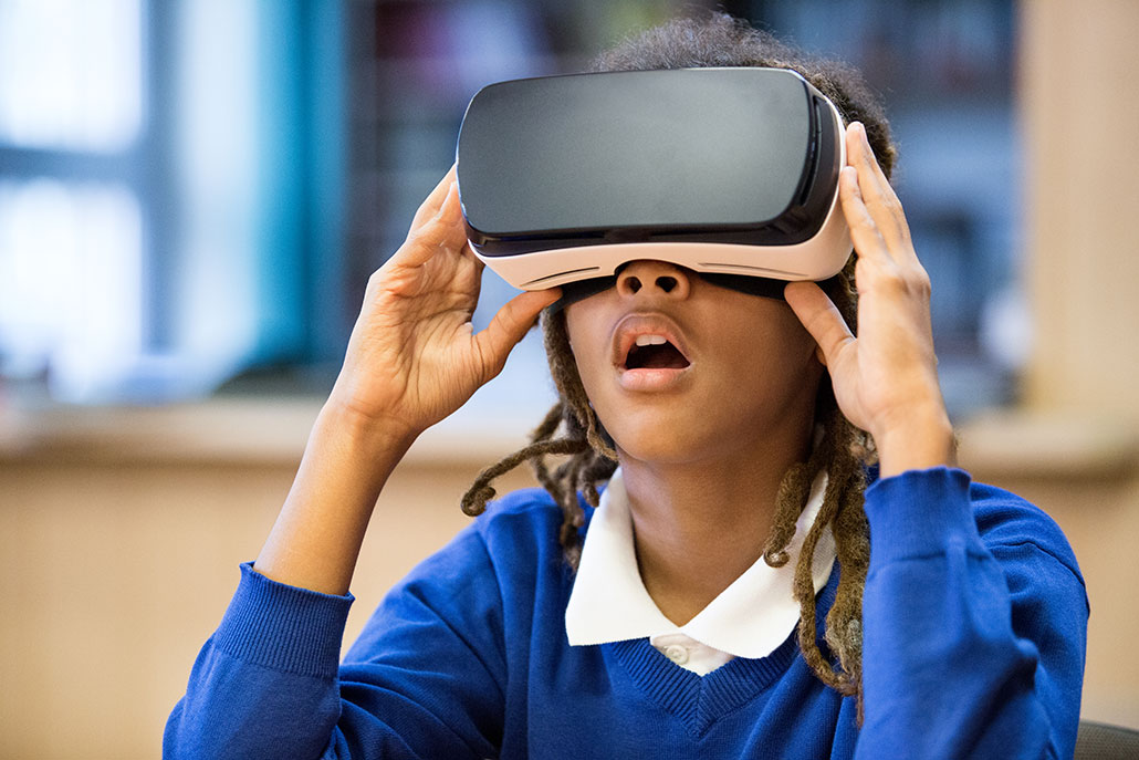 a young african american teen wearing a VR headset and looking vaguely dismayed