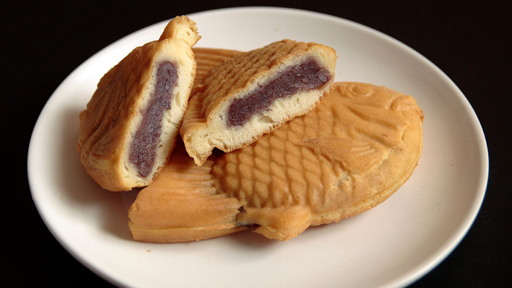 A plate with fish shaped pastries filled with red bean filling
