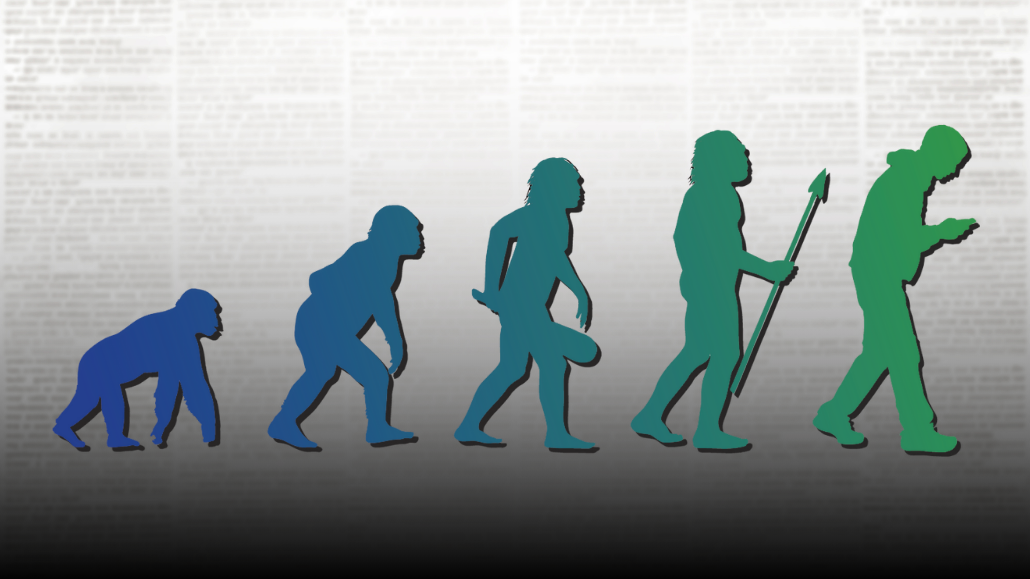 silhouttes of ancient ancestors of humans from left (most ape like) to right (modern human with smart phone) over a newspaper